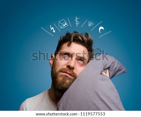 Man having problems and cant sleep Royalty-Free Stock Photo #1119577553