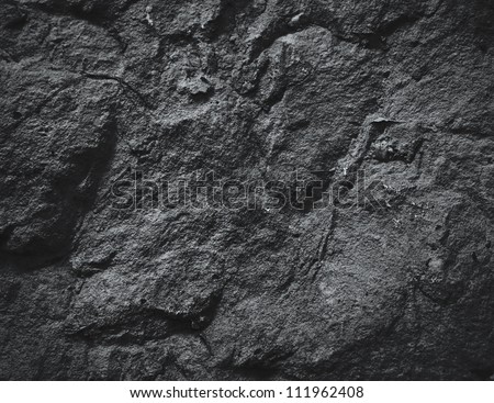 surface of the cave rock wall. gray stone texture background. Royalty-Free Stock Photo #111962408