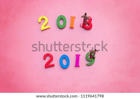 small business people standing on colorful wooden numbers forming the number 2019, For the new year 2019