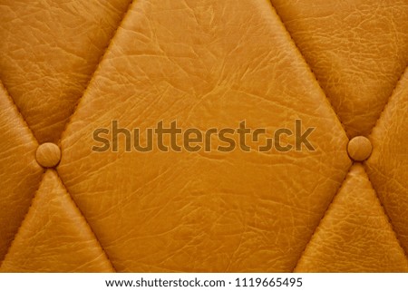 Orange couch leather background. 