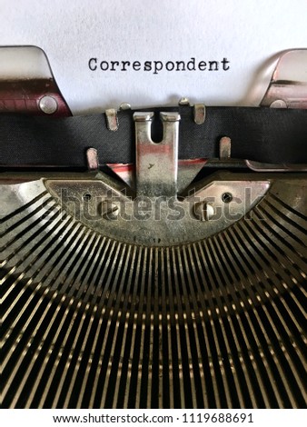 Correspondent, occupation title heading typed in black ink on vintage manual typewriter machine