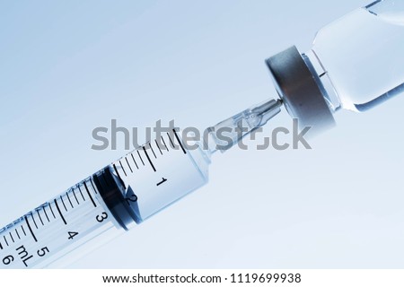 medicine bottle for injection medical glass vials and syringe for vaccination Royalty-Free Stock Photo #1119699938