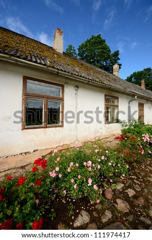 old european building and roses