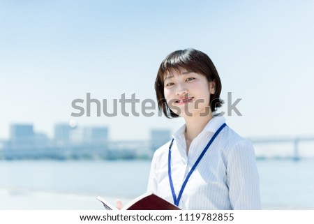 Woman with a smile (business image, new employee) Royalty-Free Stock Photo #1119782855
