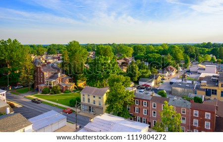 Aerial view of suburban houses and sunset sky - West Chester, Pennsylvania, USA Royalty-Free Stock Photo #1119804272