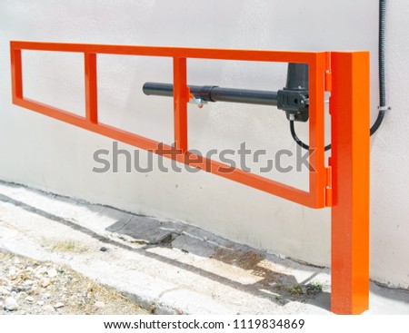 Automatic barrier gates to entry the courtyard of the building