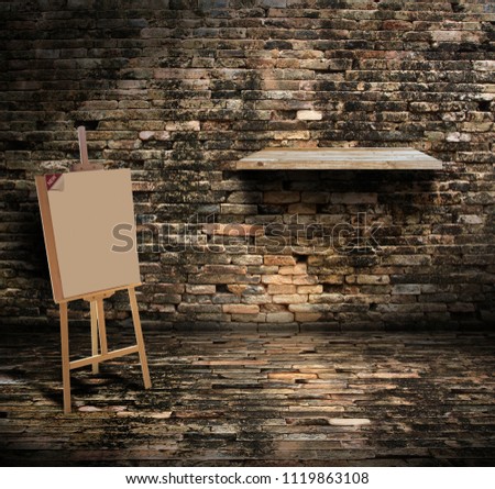 Wooden easel canvas stand with wood shelf mock up in brick wall room