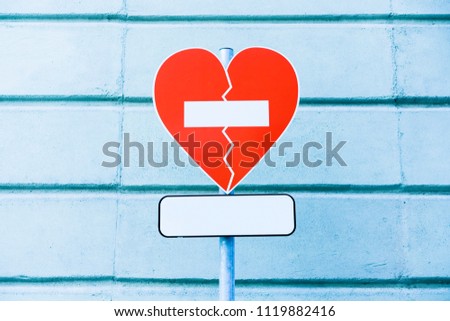 road sign heart, blue background