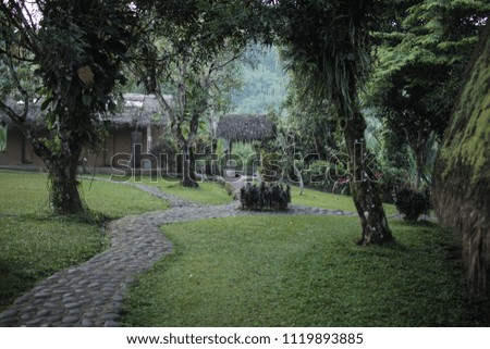 garden house with shady trees