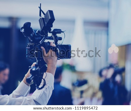 videographer close up, cameraman, movie, man with camera, movie, professional camera
