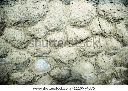 pictured in the photo relief background of concrete stones