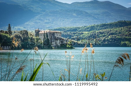 Toblino lake and the famous Toblino castle - Trentino Alto Adige, Italy. The castle at sunrise.