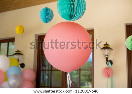birthday decoration with colorful balloons and paper decor