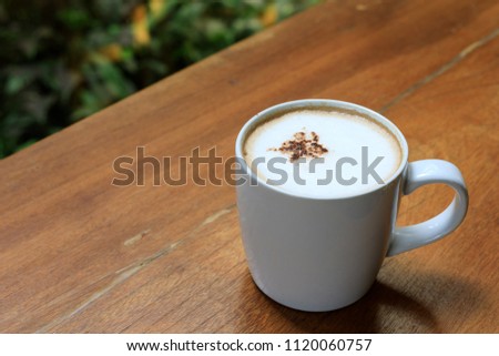 Coffee cup in coffee shop - nature style effect picture