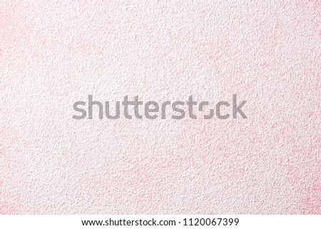 Powder sugar on pink background