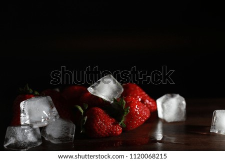 Fresh ripe strawberries on a wooden table