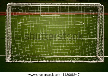Soccer ball on the green field