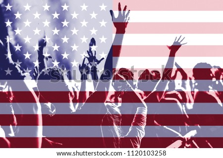 People celebrating Independece day in the United States of America. Patriotic concept. Background of USA flag blending and silhouette of cheering crowd with raised arms