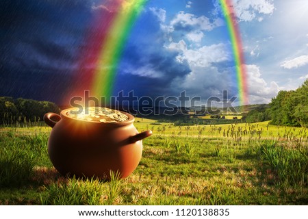 Pot full of gold at the end of the rainbow. Royalty-Free Stock Photo #1120138835