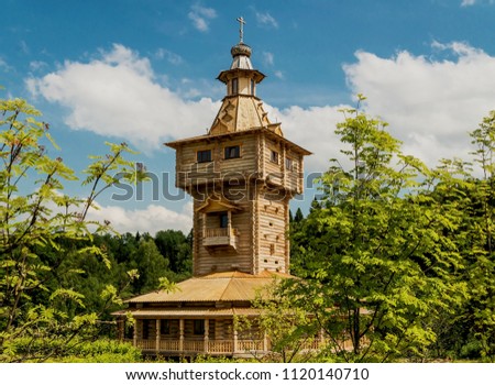 Wooden church standing in the forest Royalty-Free Stock Photo #1120140710