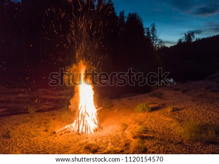 Ligo bonfire. Latvia, Gauja river beach.  Midsummer.  .