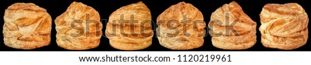 High Resolution Six Freshly Baked Sesame Cheese Puff Pastry Buns Isolated on Black Background