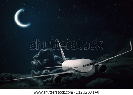 plane flies on the night sky and the sun backgrounds