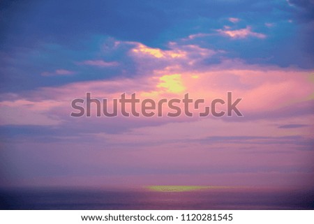 A beautiful evening sky with unusual clouds over the Mediterranean Sea of Côte d'Azur. Background
