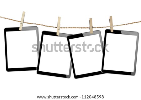 tablet computer pc in Wood clamps on white background + Clipping Path
