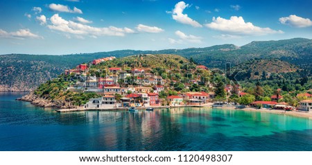 Fantastic morning cityscape of Asos village on the west coast of the island of Cephalonia, Greece, Europe. Wonderful spring sescape of Ionian Sea. Traveling concept background. Royalty-Free Stock Photo #1120498307