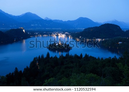 Bled Lake with Church Island and Castle Behind at Dusk
