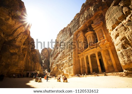 The Treasury (Al Khazneh) of Petra Ancient City with Golden Sun, Jordan Royalty-Free Stock Photo #1120532612