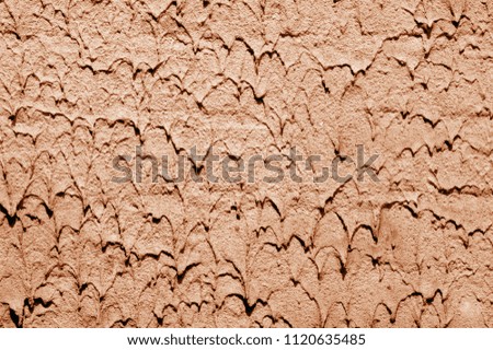 background texture, pattern. plaster building by spraying. The mass of a thick lime solution with sand. a repeated decorative design.
