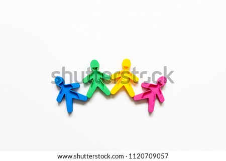 Friendship of peoples is a symbol of colored men on a white background. Copy space