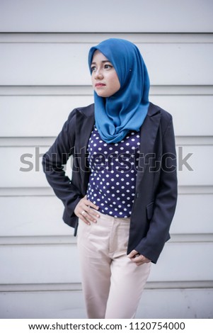 Portraiture of a beautiful young asian muslim businesswoman. People business working concept.