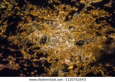 Paris seen from space. Night Paris a view from space, from above.  Paris from the sky. Elements of this image furnished by NASA.