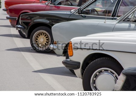 Classical cars lined up for outdoors exhibition Royalty-Free Stock Photo #1120783925