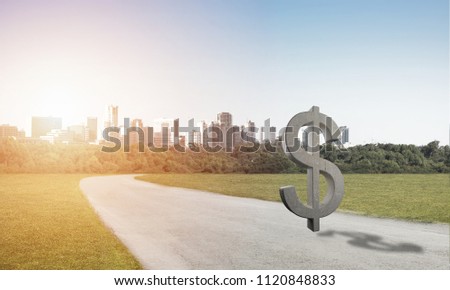 Stone dollar symbol on natural landscape as currency sign