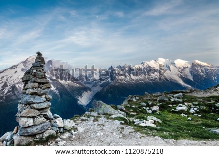 Cairn facing Mont Blanc Massif, near the Lac Blanc, Inside the Nature Reserve of Aiguilles Rouges, France.