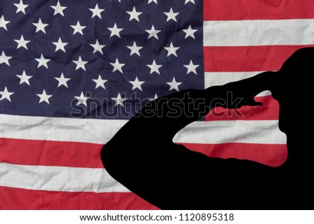 Table top view aerial image of 4th July independence day holiday background concept.Flat lay soldier saluting on USA flag wallpaper for sign of season.Free space for creative design text & content.