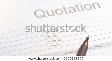 Quotation business document on paper background. Business concept.