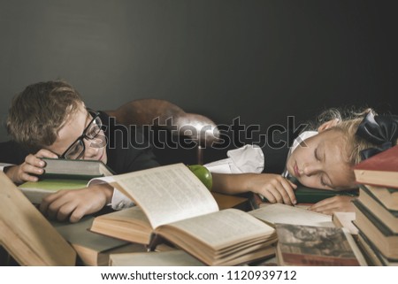 Old Photo Of Back To School In September. Your Kids School Boy And Girl Sleeping At The Table. Table With Many Books And One Green Apple At Library