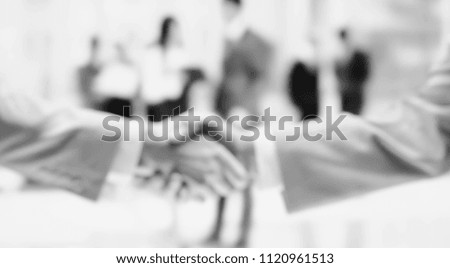 blurred background of business hands, bargain