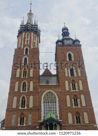 St. Mary Basilica at the Market Square in Krakow, Poland.                                