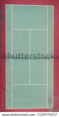 Aerial view of an emtpy tennis court. Top view of a tennis court in high resolution