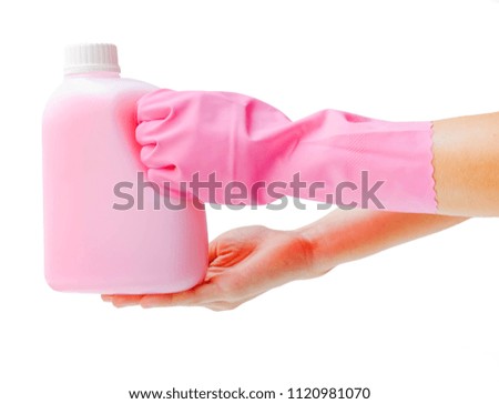 
Women's hand wears pink rubber gloves. Prevent germs to clean and work. Wearing gloves Grab the bottle of cleanser and sponge isolated on white background.