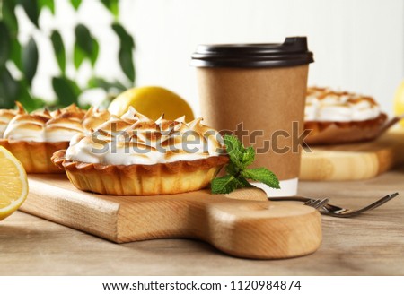 Lemon pie with meringue and a glass of coffee