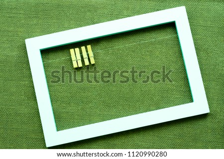 Blue frame  isolated on green grass background, with path 