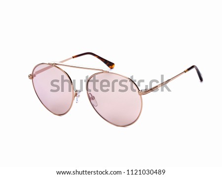 Sunglasses with pink lens on isolated white