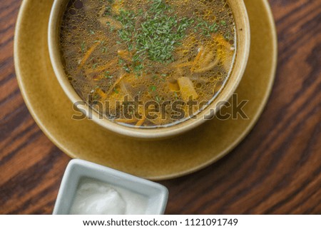 rich mushroom soup with vegetables and herbs